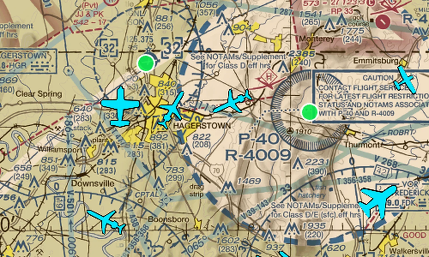 Close-up of METARBoard's live ADS-B traffic icons rendered as real aircraft shapes over a sectional chart near Hagerstown